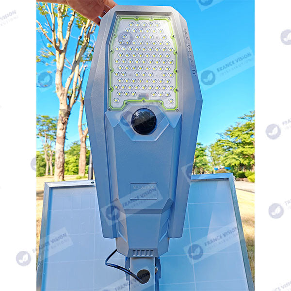 Lampe de rue solaire - Série INTERSTELLAR ULTRA - 600 Watts - 3600 Lumens - Angle 150x70° - IP65 - Lampe 62 x 30 x 8 cm - Panneau 67 x 45 cm - Controleur intelligent - Avec télecommande - Capteur PIR - 3000k - Support inclus - Capteur crépusculaire