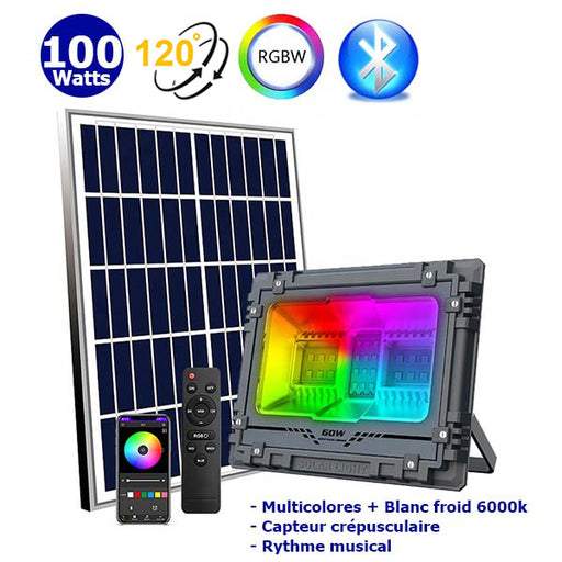 Projecteur LED solaire - Série WARRIOR RGBW (Multicolores + Blanc) - 100 Watts - Angle 120° - Lampe 26 x 20 x 6 cm - IP67 - Avec télécommande - Avec capteur crépusculaire - Bluetooth - Rythme musical - Panneau solaire inclus